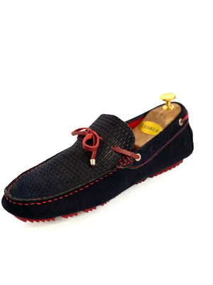 The Classic Navy Blue Moccasin Leather Slipper Shoe With Sheepskin Lining, Rubber Soles, Leather Shoelaces, Whipstitch Details At Toe, Classic Woven Styling. The Moccasin is made entirely out of the softest, most comfortable, breathable and durable leather. Jebranco New York NYC. Men Moccasin Slipper Shoe, Man Moccasin Slipper Shoe, Boat Shoe, Leather Shoe, NYC Shoe Store, NYC Online Shoe Store, Slippers, Slipper Shoe. Custom Made Shoe In NYC. Navy Moccasin Slipper Shoe.