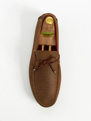 The Classic Tan Moccasin Leather Slipper Shoe With Sheepskin Lining, Rubber Soles, Leather Shoelaces, Whipstitch Details At Toe, Classic Woven Styling, And Moc-toe moccasin with saddle bit. The Moccasin is made entirely out of the softest, most comfortable, breathable and durable leather. Jebranco New York NYC. Men Moccasin Slipper Shoe, Man Moccasin Slipper Shoe, Boat Shoe, Leather Shoe, NYC Shoe Store, NYC Online Shoe Store, Slippers, Slipper Shoe. Custom Made Shoe In NYC. Tan Moccasin Slipper Shoe.