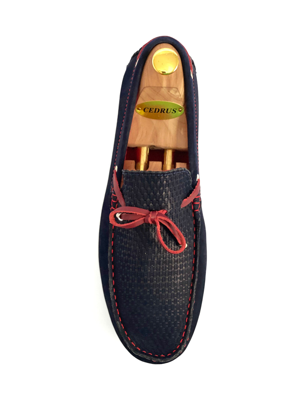 The Classic Navy Blue Moccasin Leather Slipper Shoe With Sheepskin Lining, Rubber Soles, Leather Shoelaces, Whipstitch Details At Toe, Classic Woven Styling. The Moccasin is made entirely out of the softest, most comfortable, breathable and durable leather. Jebranco New York NYC. Men Moccasin Slipper Shoe, Man Moccasin Slipper Shoe, Boat Shoe, Leather Shoe, NYC Shoe Store, NYC Online Shoe Store, Slippers, Slipper Shoe. Custom Made Shoe In NYC. Navy Moccasin Slipper Shoe.